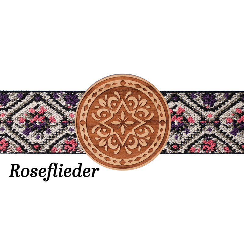 Schürzenschließe rund mit floralem Musterband