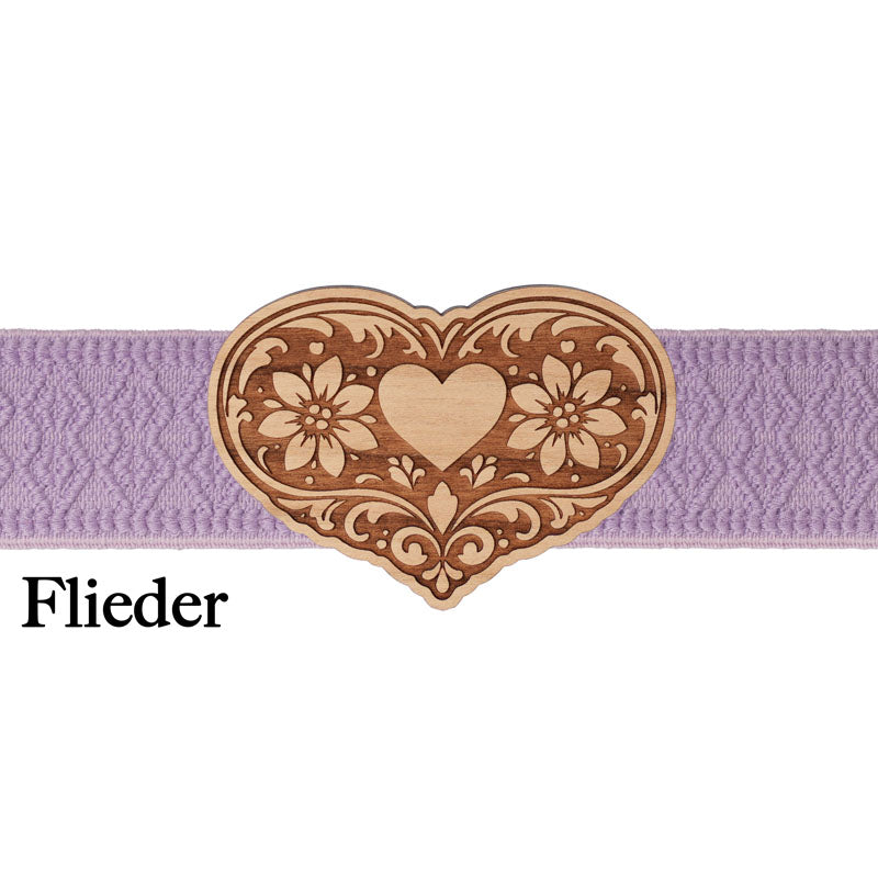 Feminine Dirndlschließe mit fliederfarbenem Band und floralem Design