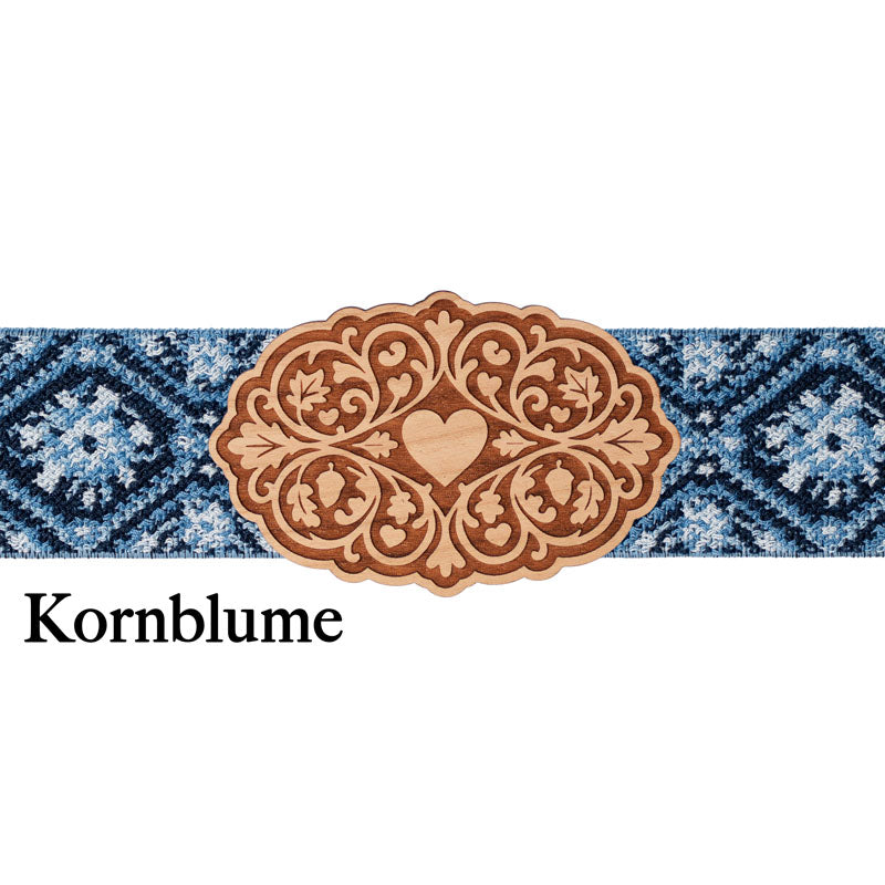 Schürzenschließe mit blau gemustertem Band