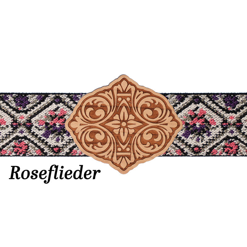 Maschd Schürzenschließe mit floralem Musterband