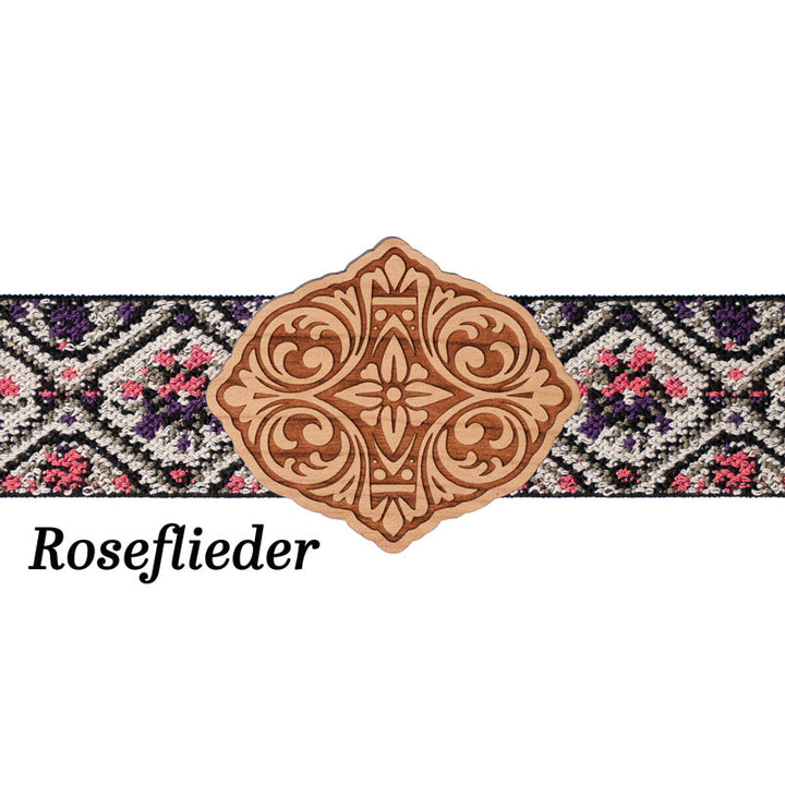 Maschd Schürzenschließe mit floralem Musterband