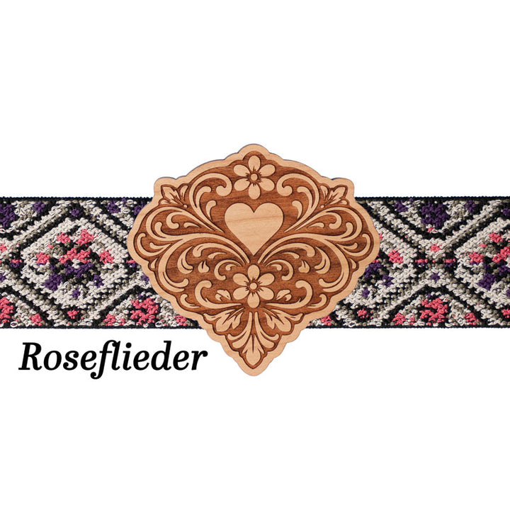 Schürzenschließe mit floralem Musterband in Rosé und Lila