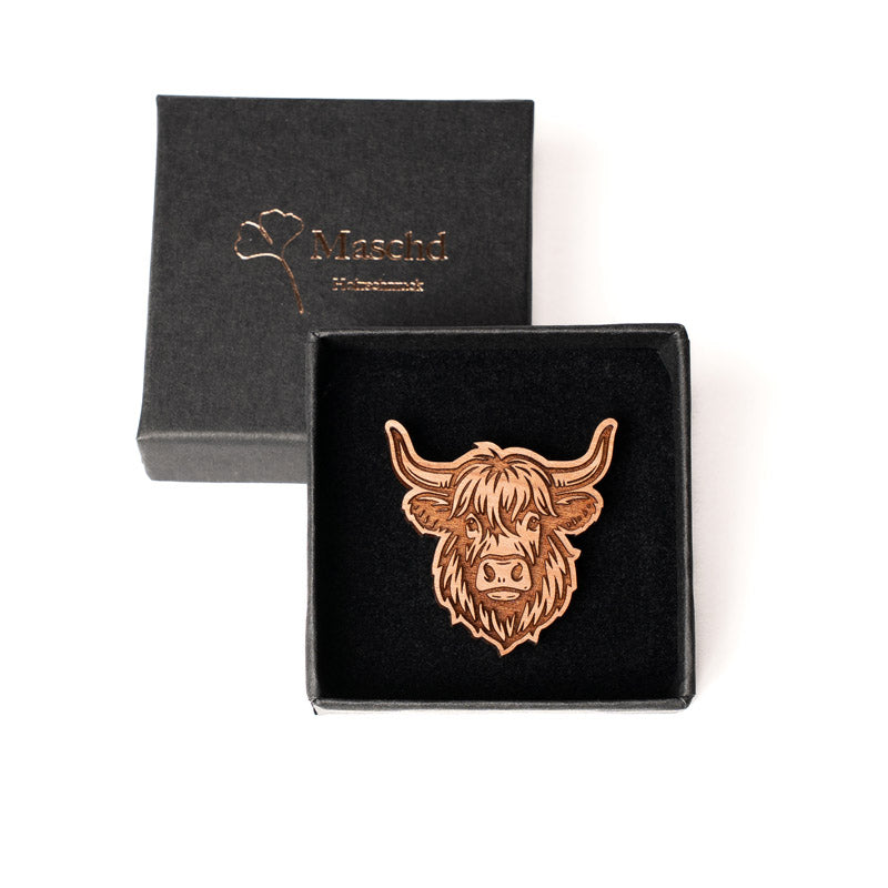 Hochlandrind Anstecker in der Verpackungsschachtel